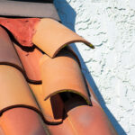 Roof,tiles,dislodged,by,strong,winds,during,storm,require,repair